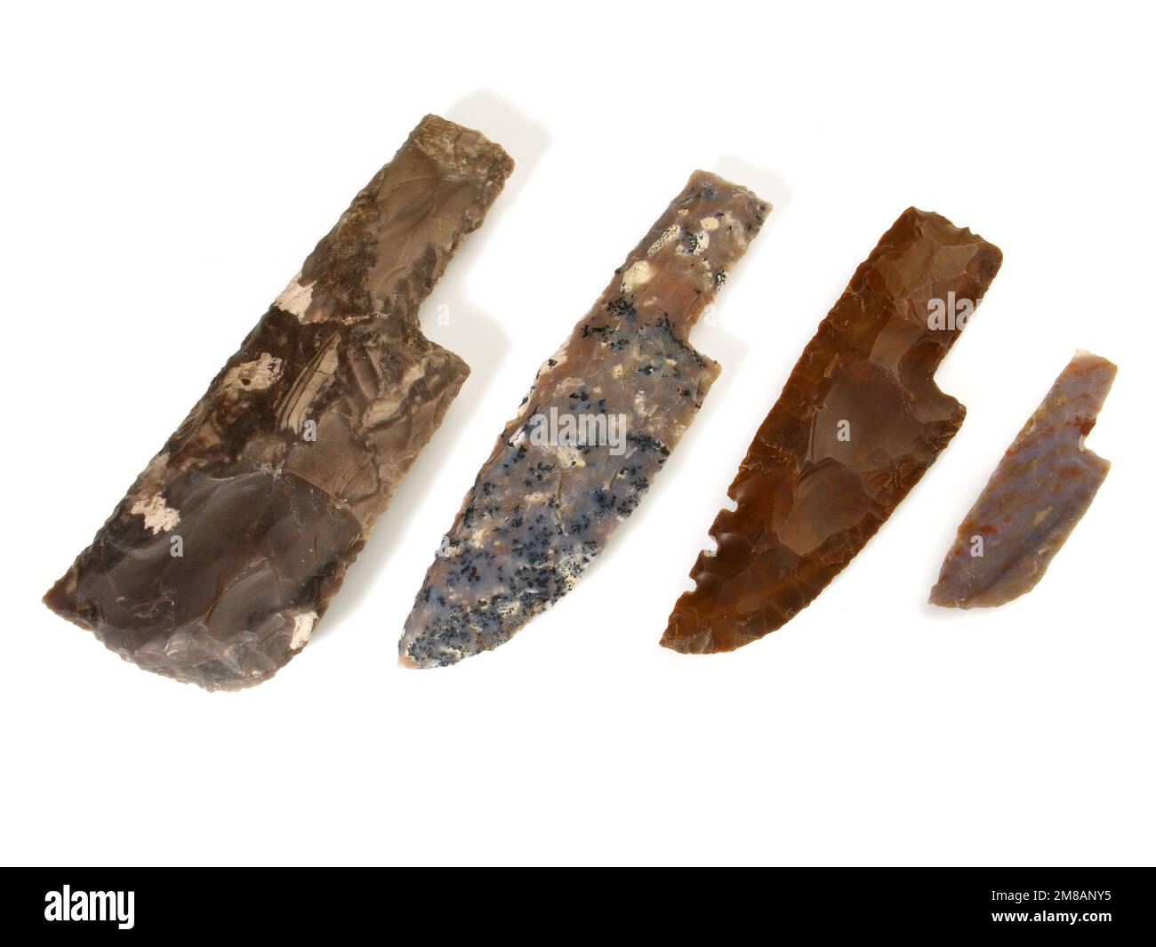 Stone Age Flint Stone Knife Blades isolated on white Background Stock