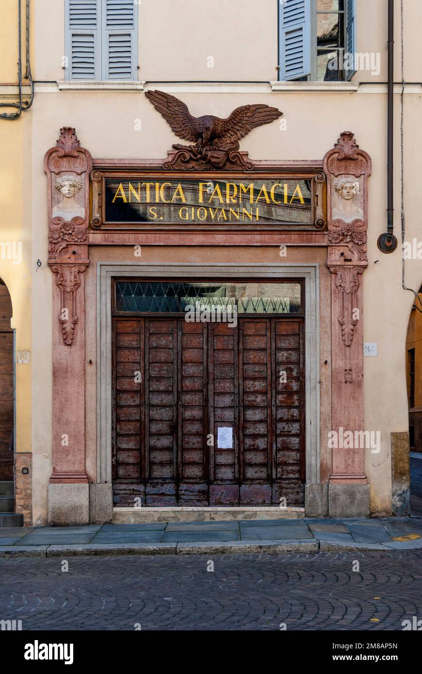 Façade of Old apothecary of Saint John, former historic pharmacy now a museum, in Parma city center, inside the abbey of San Giovanni Evangelista. Stock Photo