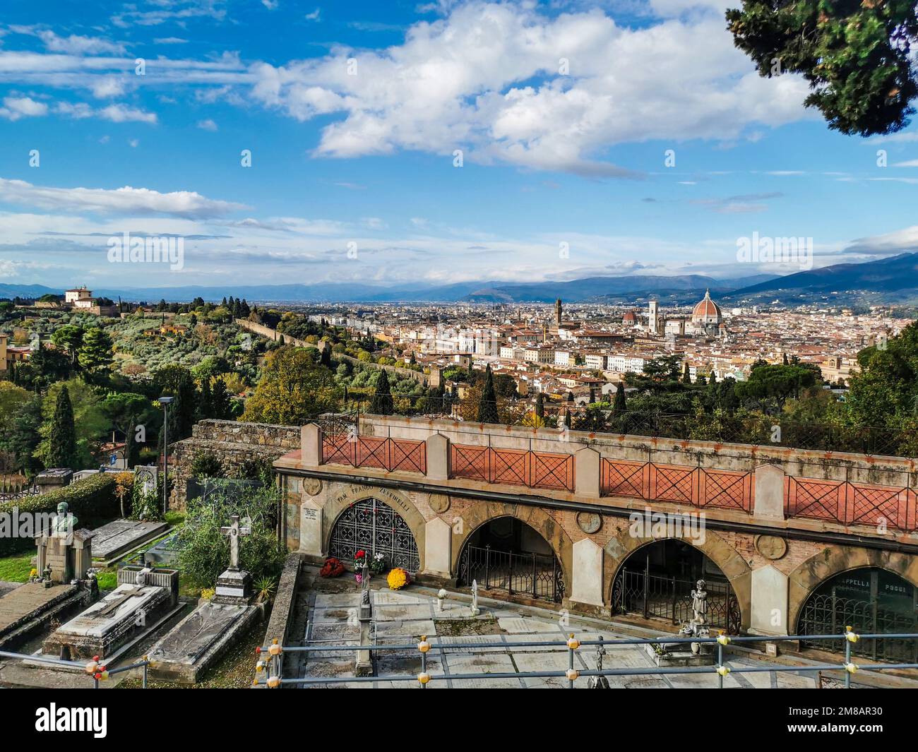 The monumental cemetery of the 'Porte Sante' next to the Basilica of San Miniato al Monte with a panoramic view of Florence, Tuscany, Italy Stock Photo