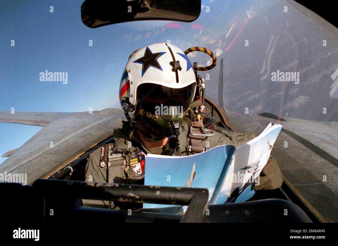 The radar intercept officer aboard a Fighter Squadron 2 (VF2) F14A