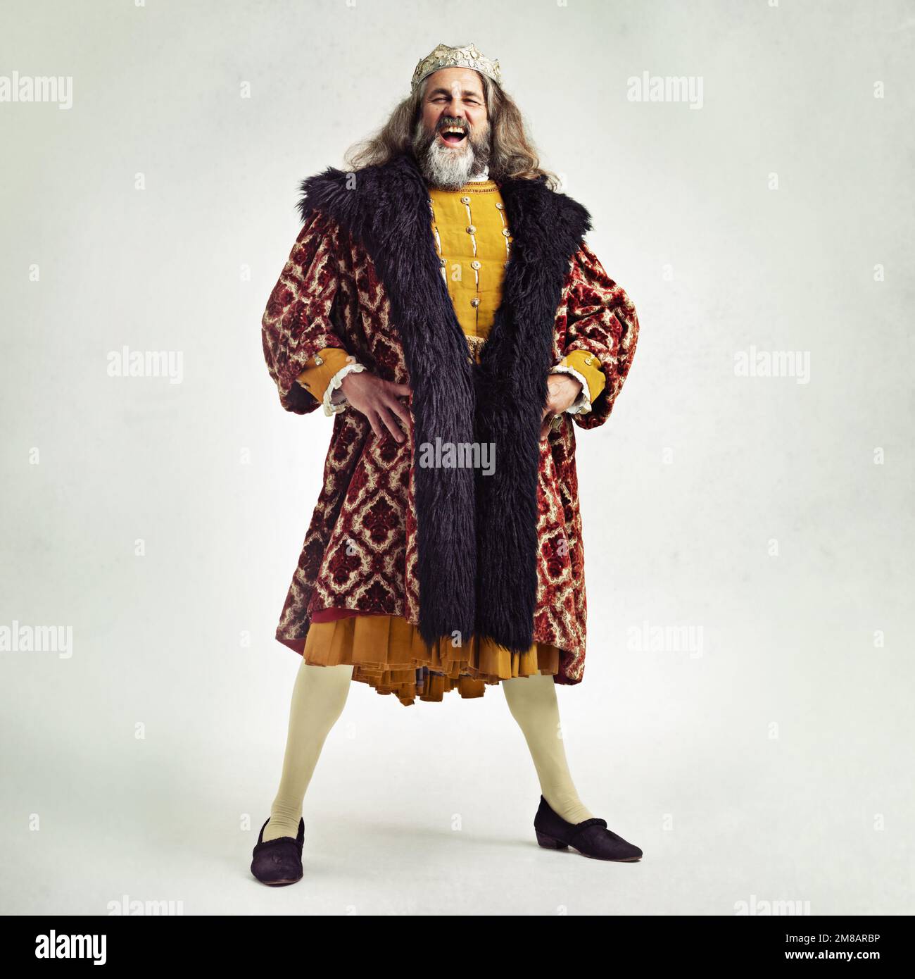 King, crown and portrait with a royal man in studio on a gray