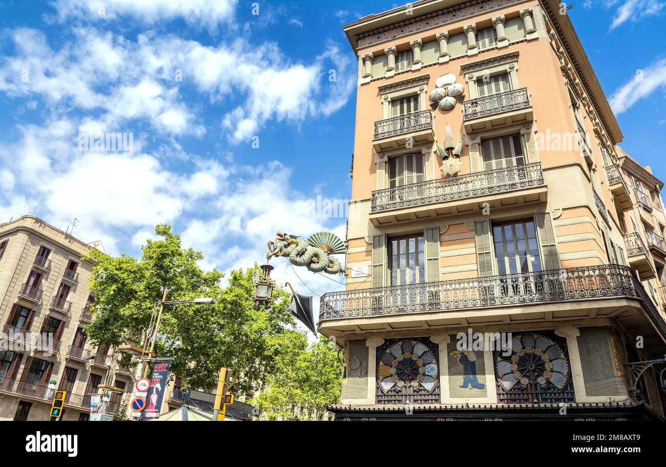 Barcelona, Spain - July 6, 2017: day view of Art Deco Building Casa Bruno Cuadros in Las Ramblas and Placa De La Boqueria in Barcelona, Spain. Stock Photo