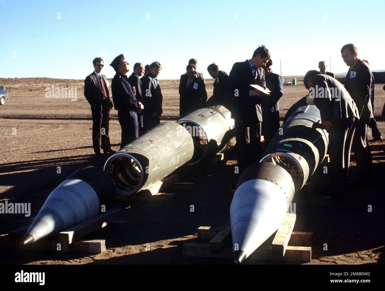 With their American escorts watching, Soviet inspectors record data from the side of a Pershing II missile prior to its destruction. Several missiles are to be destroyed in accordance with the Intermediate-Range Nuclear Forces (INF) Treaty. Base: Pueblo Army Depot Activity State: Colorado (CO) Country: United States Of America (USA) Stock Photo