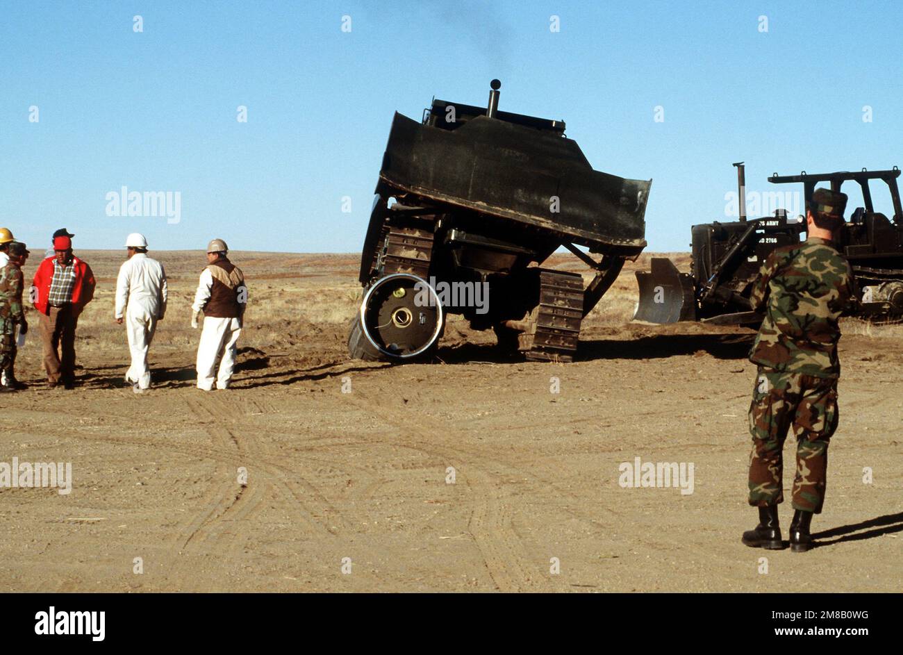 An Army D-7 bulldozer is driven onto a section of a Pershing II missile. Several missiles are being destroyed in the presence of Soviet inspectors in accordance with the Intermediate-Range Nuclear Forces (INF) Treaty. Base: Pueblo Army Depot Activity State: Colorado (CO) Country: United States Of America (USA) Stock Photo