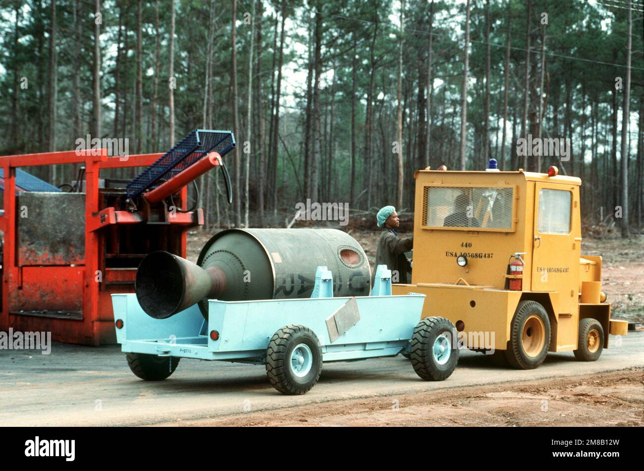 A spent propulsion stage of a Pershing 1A missile is transported in a trailer to a crusher, where its destruction will be completed. Several missiles are being destroyed in the presence of Soviet inspectors in accordance with the Intermediate-Range Nuclear Forces (INF) Treaty. Base: Longhorn Army Ammunition Plant State: Texas (TX) Country: United States Of America (USA) Stock Photo