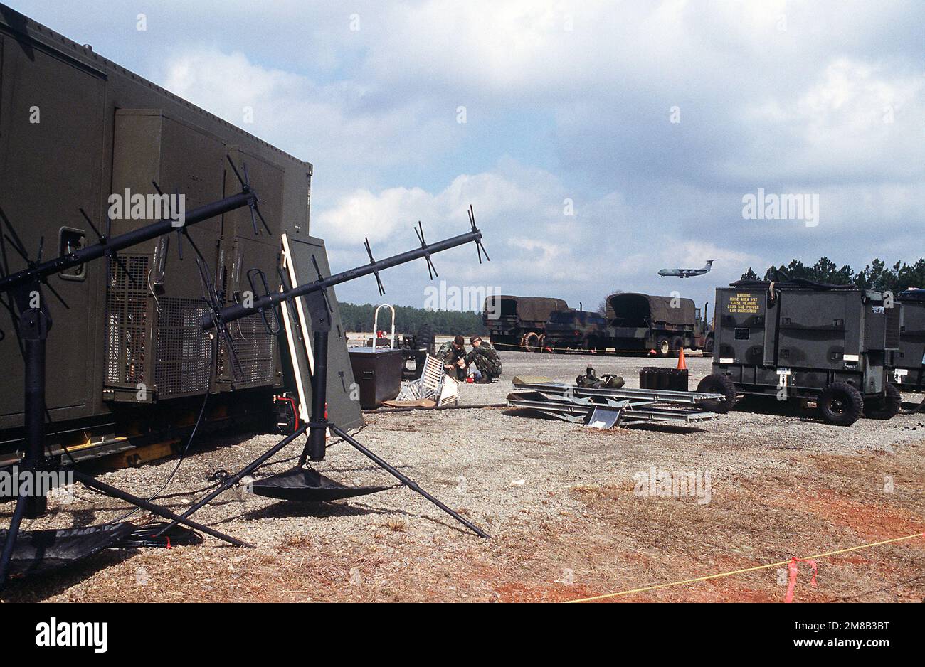 With two satellite communications antennas in the foreground two