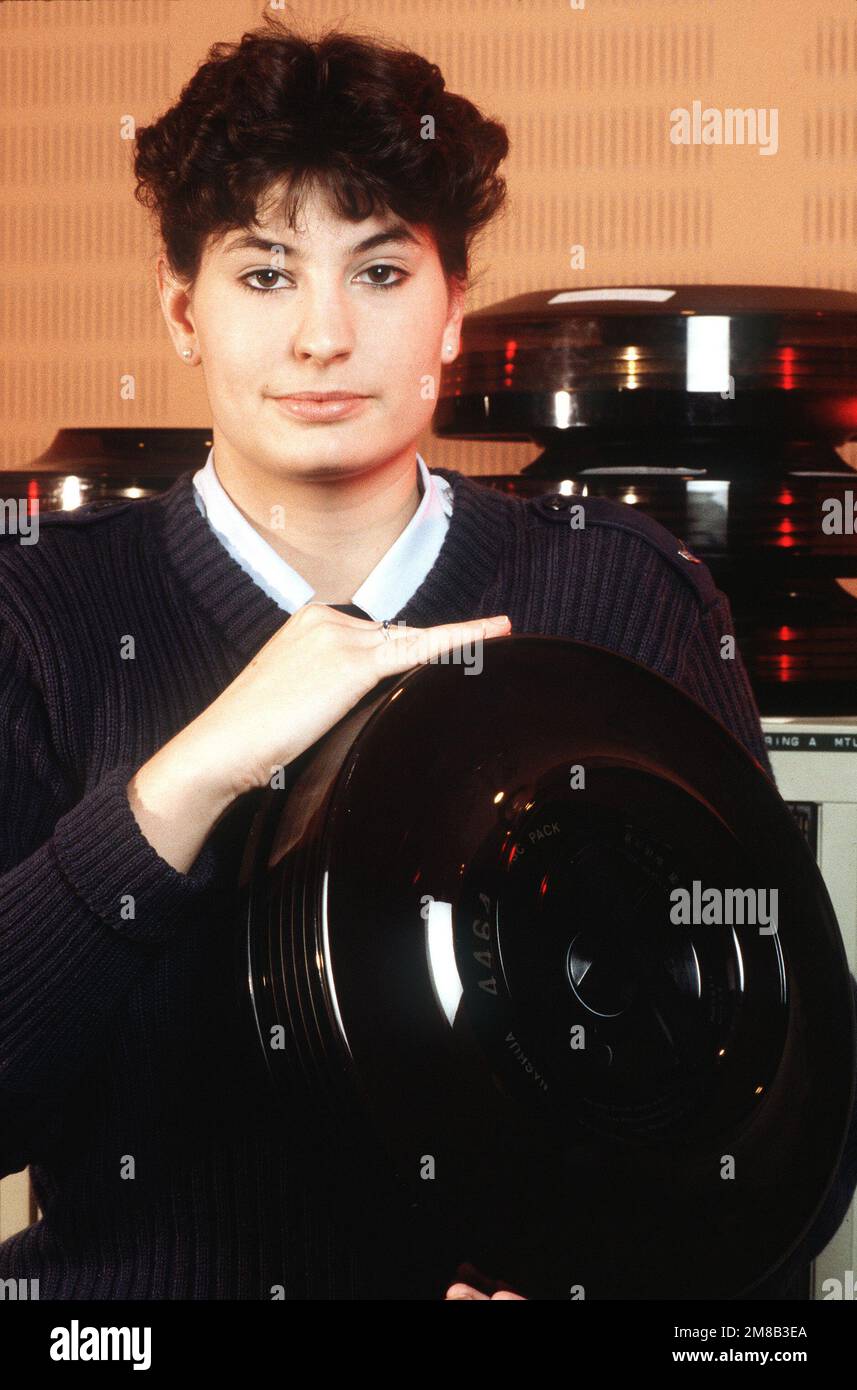 airman-1st-class-shelly-drain-holds-a-hard-disk-used-in-a-berlin-air