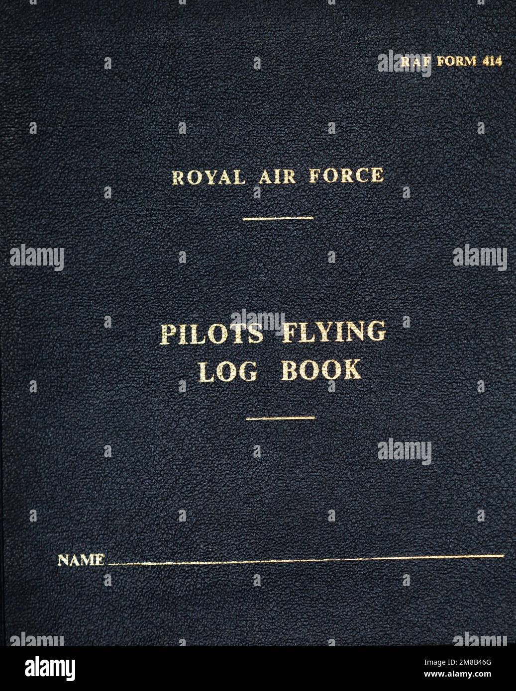 Royal Air Force RAF Form 414 Pilots Flying Log book. Gold embossed on blue cover. Stock Photo