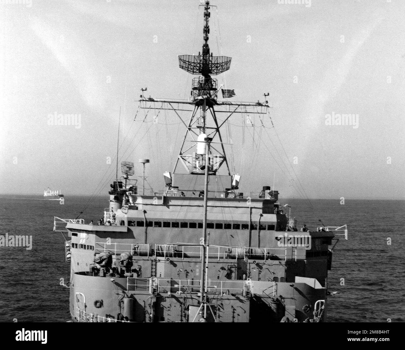 A close-up view of the mast and bridge structure aboard the docklanding ship USS PORTLAND (LSD-37), as seen from the ship's bow. Country: Atlantic Ocean (AOC) Stock Photo