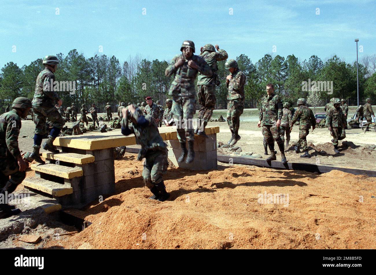 Members of the 82nd Airborne Division practice their parachute landing
