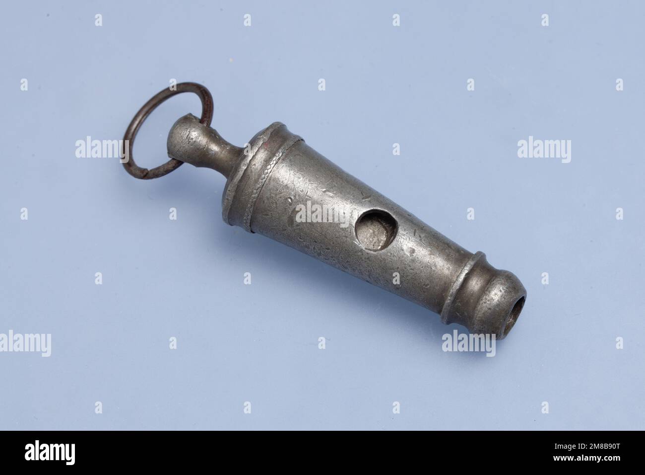 Small Victorian Beaufort whistle made of pewter or Britannia metal Stock Photo