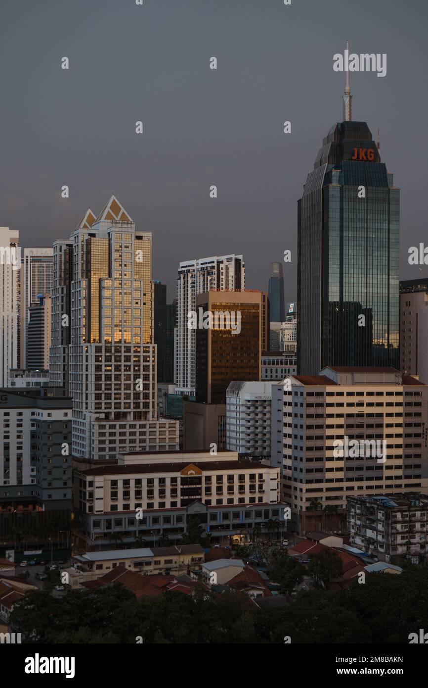 A vertical shot of modern buildings in the city center of Kuala Lumpur ...