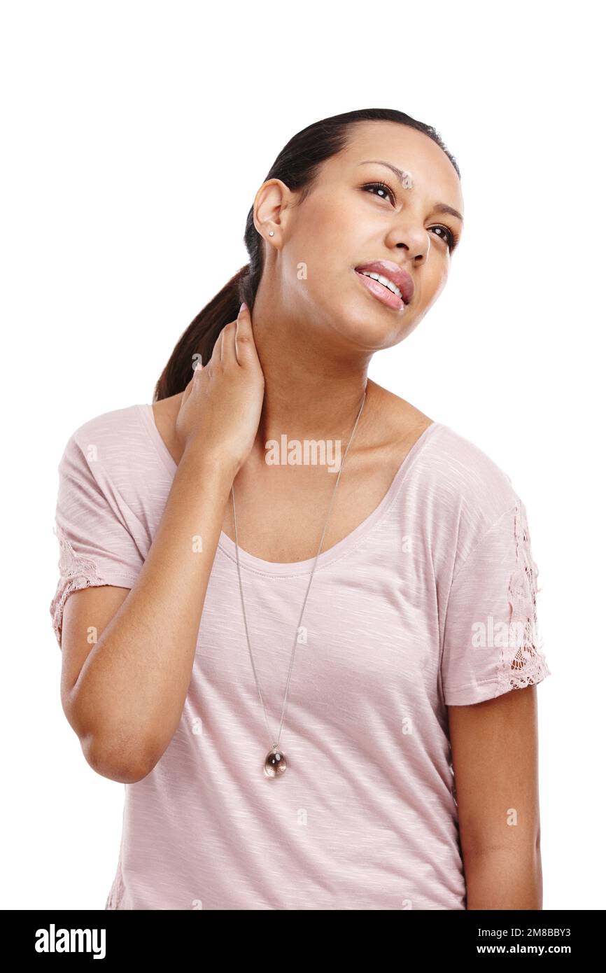 Stress, uncomfortable and model in studio with neck pain, injury or accident for medical emergency. Painful, hurt and girl from Mexico with muscle Stock Photo