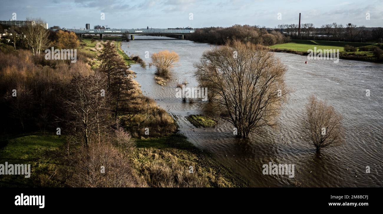 VENLO - A drone photo of high water levels in the river Maas near Venlo. Due to the heavy rainfall in the two weeks of January, the water level in the rivers is rising very fast. Farmers and residents are asked to empty floodplains so that the water can drain away and weirs are opened. ANP ROB ENGELAAR netherlands out - belgium out Stock Photo