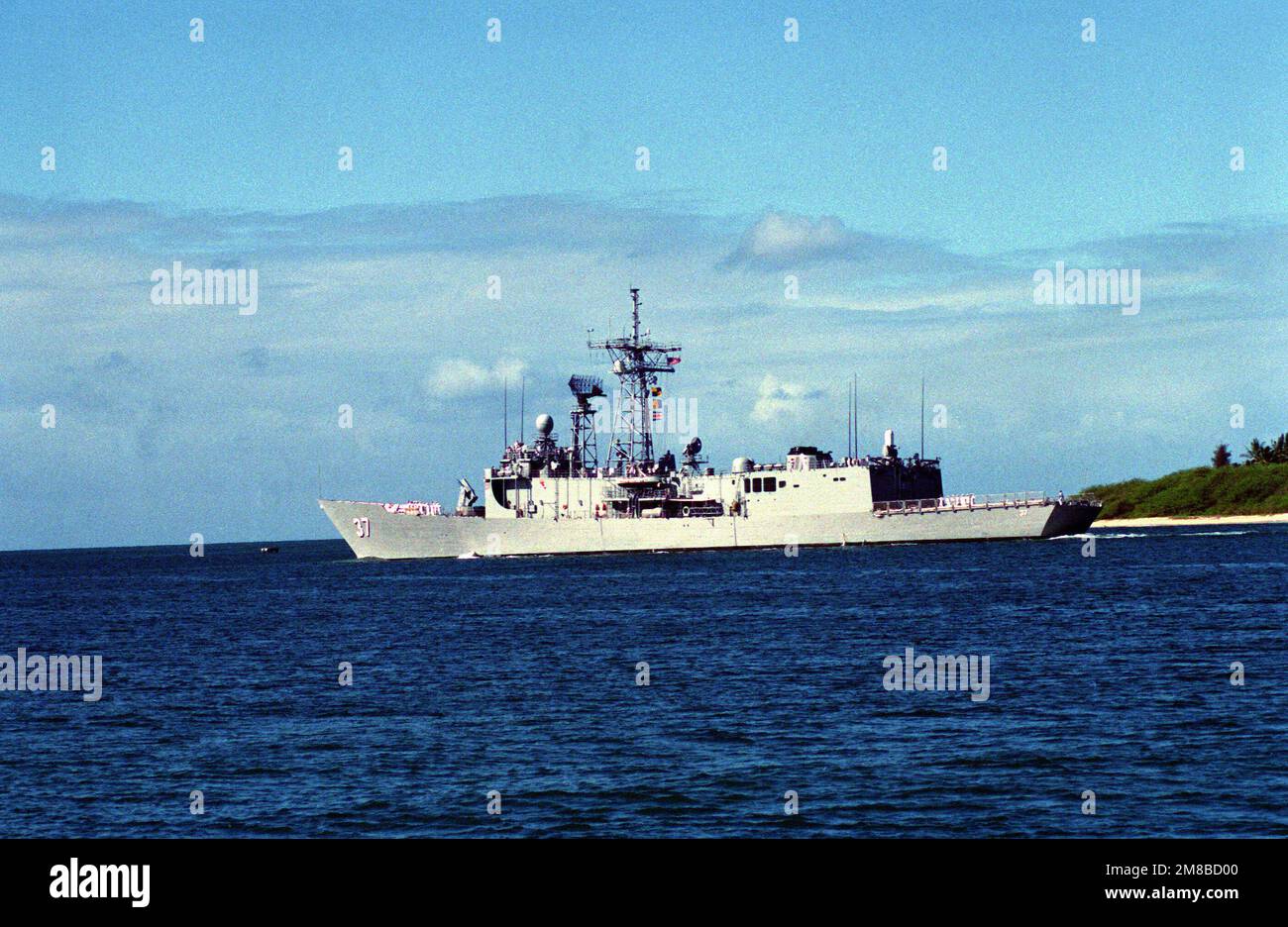 A port quarter view of the guided missile frigate USS CROMMELIN (FFG37
