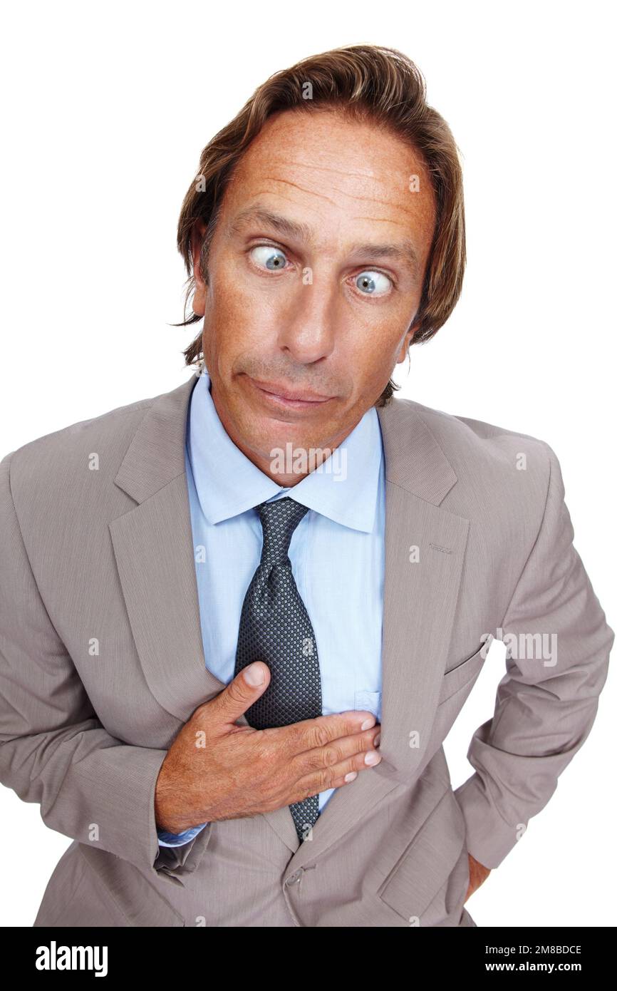 Comedy, crazy and man portrait of a business man with a silly face and suit with white background. Comic, joke and crossed eyes of a vertical Stock Photo