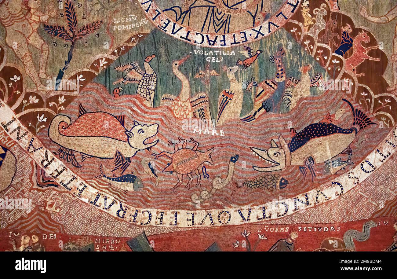 Creation of animals from ancient christian tapestry of Girona, Spain Stock Photo