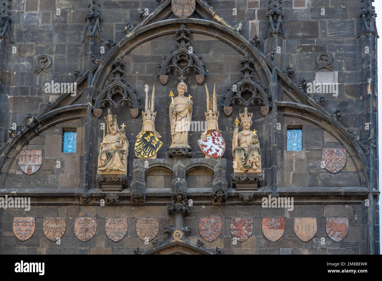 Sculptures at Old Town Bridge Tower at Charles Bridge with Charles IV, Wenceslas IV and St. Vitus - Prague, Czech Republic Stock Photo