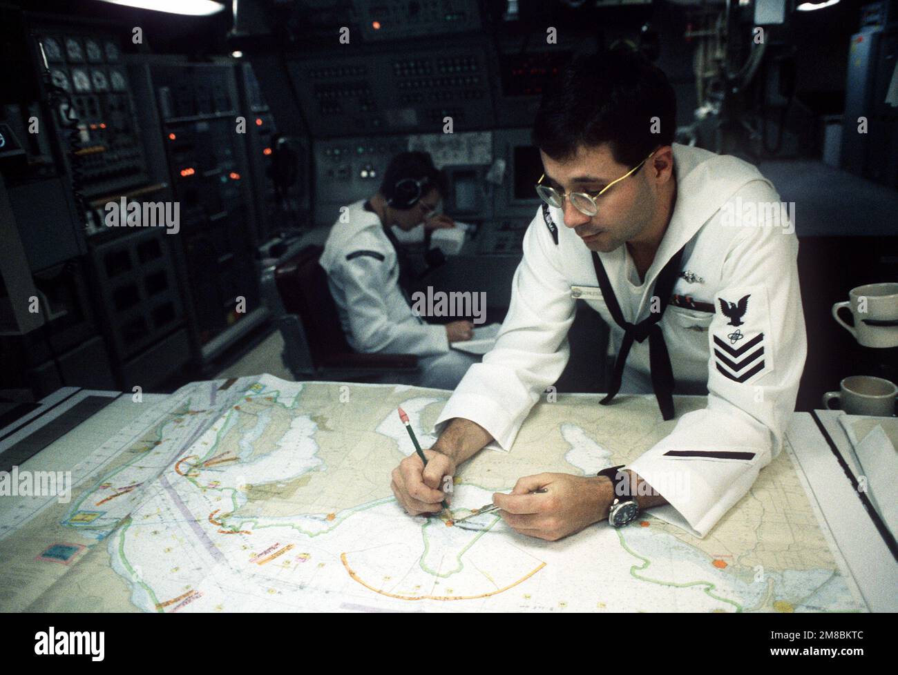 Electronics Technician 1ST Class David Schlessinger checks a