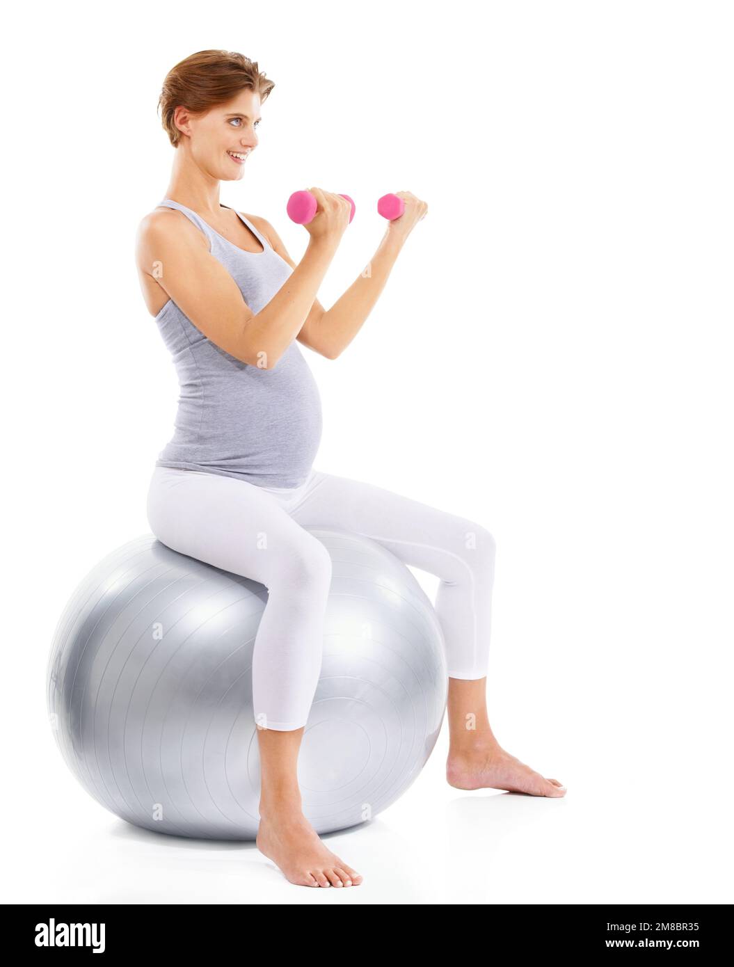 Fitness, exercise and pregnant woman weightlifting on ball for maternal
