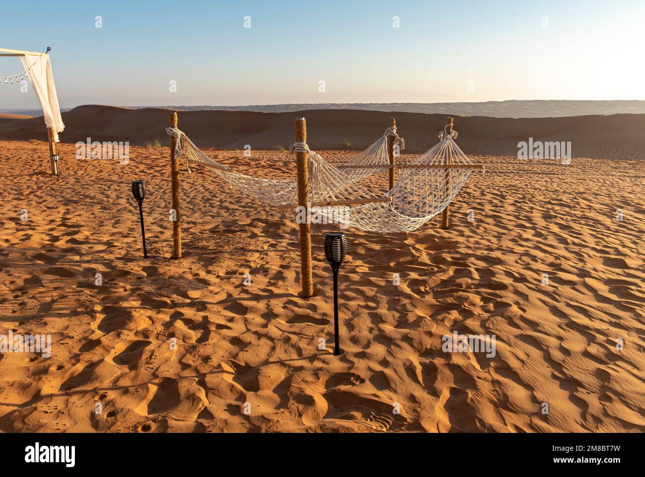 Two hammocks in desert camp, Wahiba Sands, Bidiyah, Oman Stock Photo