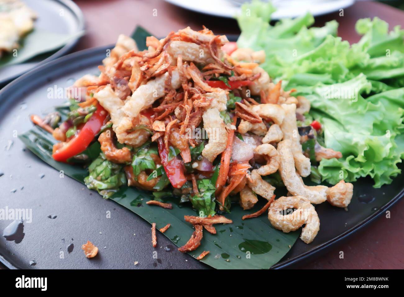 spicy salad , pork crackling salad or pork rind salad or Thai spicy