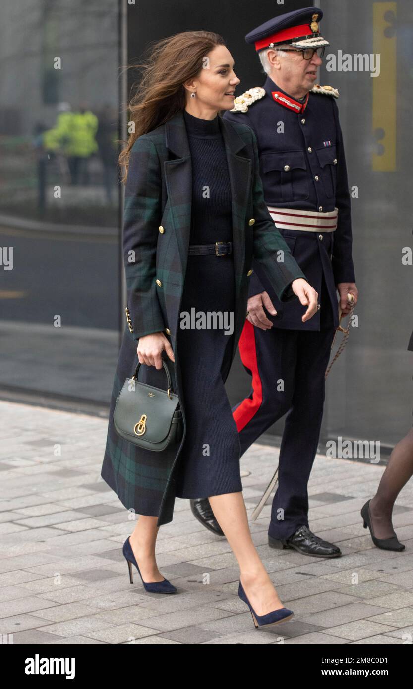 Liverpool, England. UK. 12 January, 2023.   Catherine, Princess of Wales, wearing a double-breasted green and blue tartan coat by Holland Cooper, visi Stock Photo