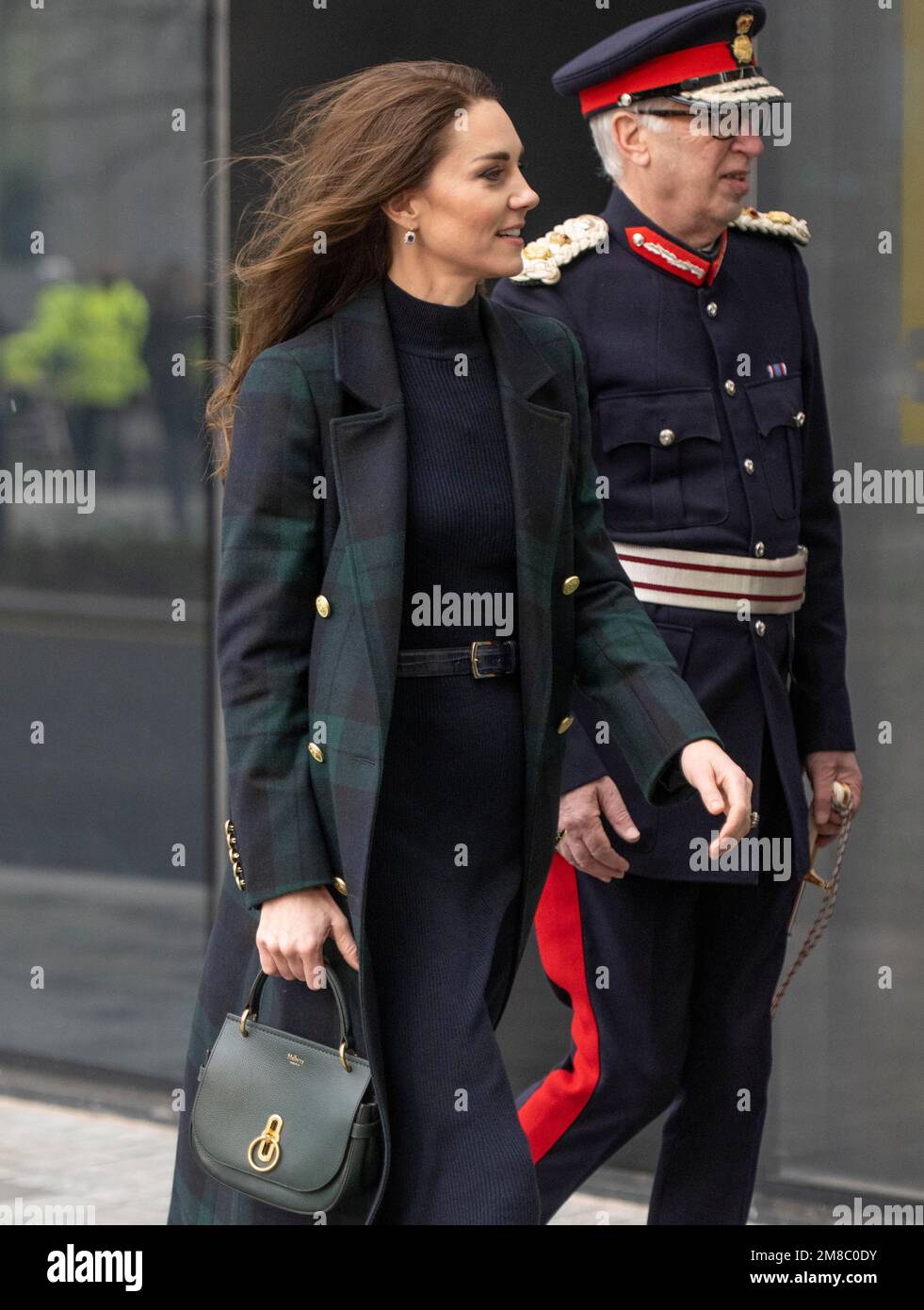 Liverpool, England. UK. 12 January, 2023.   Catherine, Princess of Wales, wearing a double-breasted green and blue tartan coat by Holland Cooper, visi Stock Photo