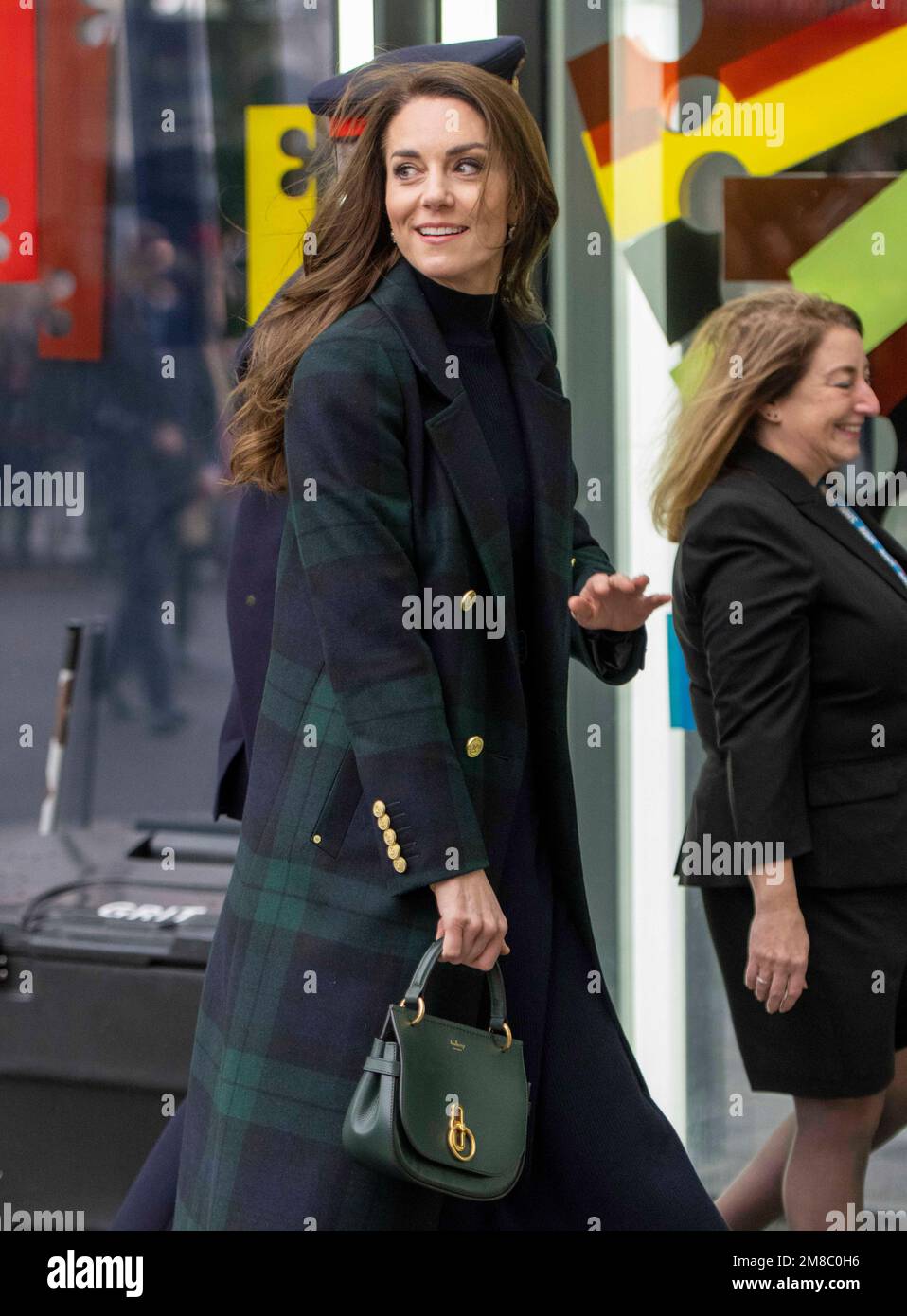 Liverpool, England. UK. 12 January, 2023.   Catherine, Princess of Wales, wearing a double-breasted green and blue tartan coat by Holland Cooper, visi Stock Photo