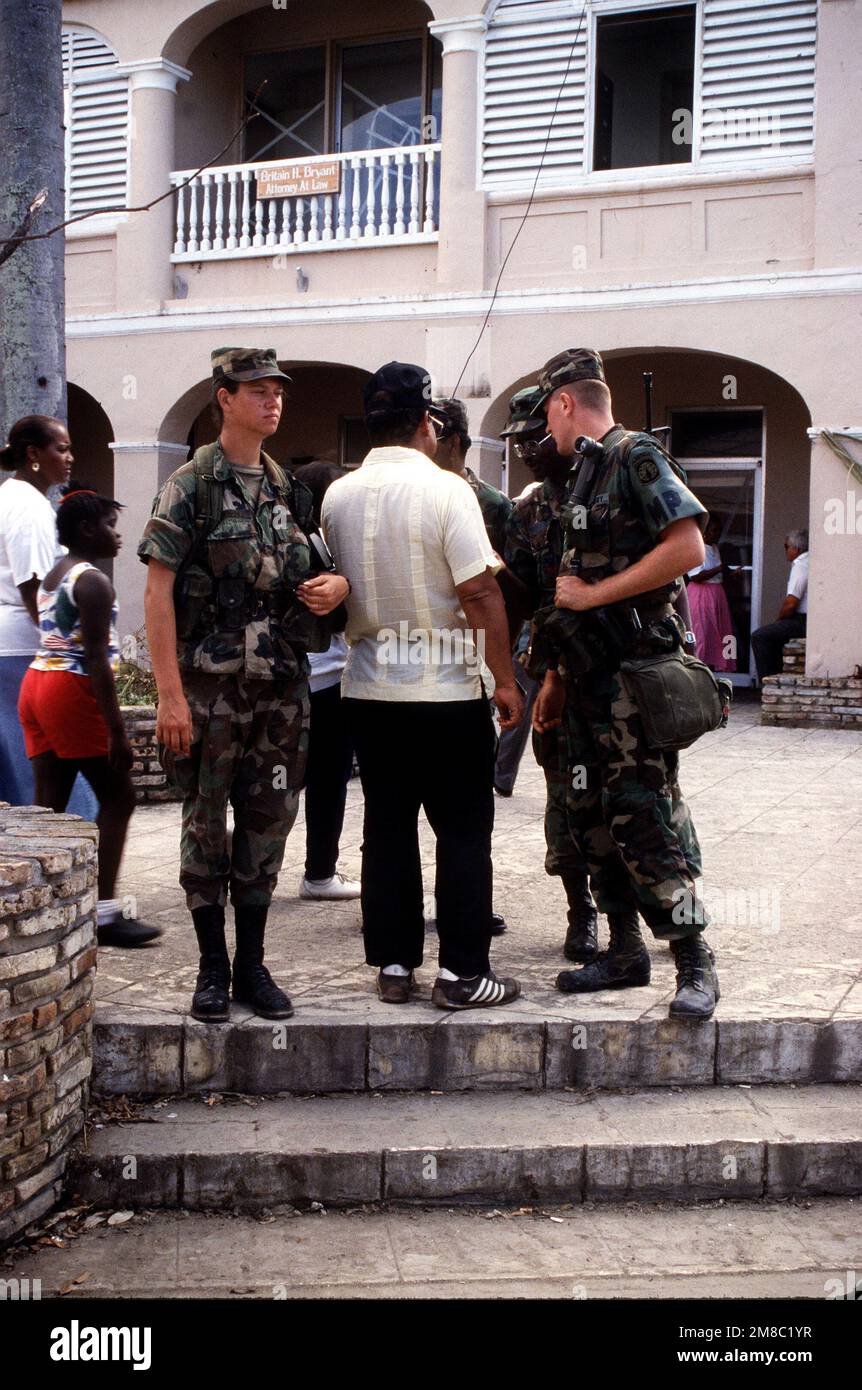 Soldiers from the 65th Military Police Company guard the 