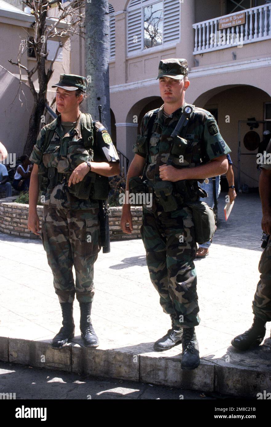 Soldiers from the 65th Military Police Company guard the 