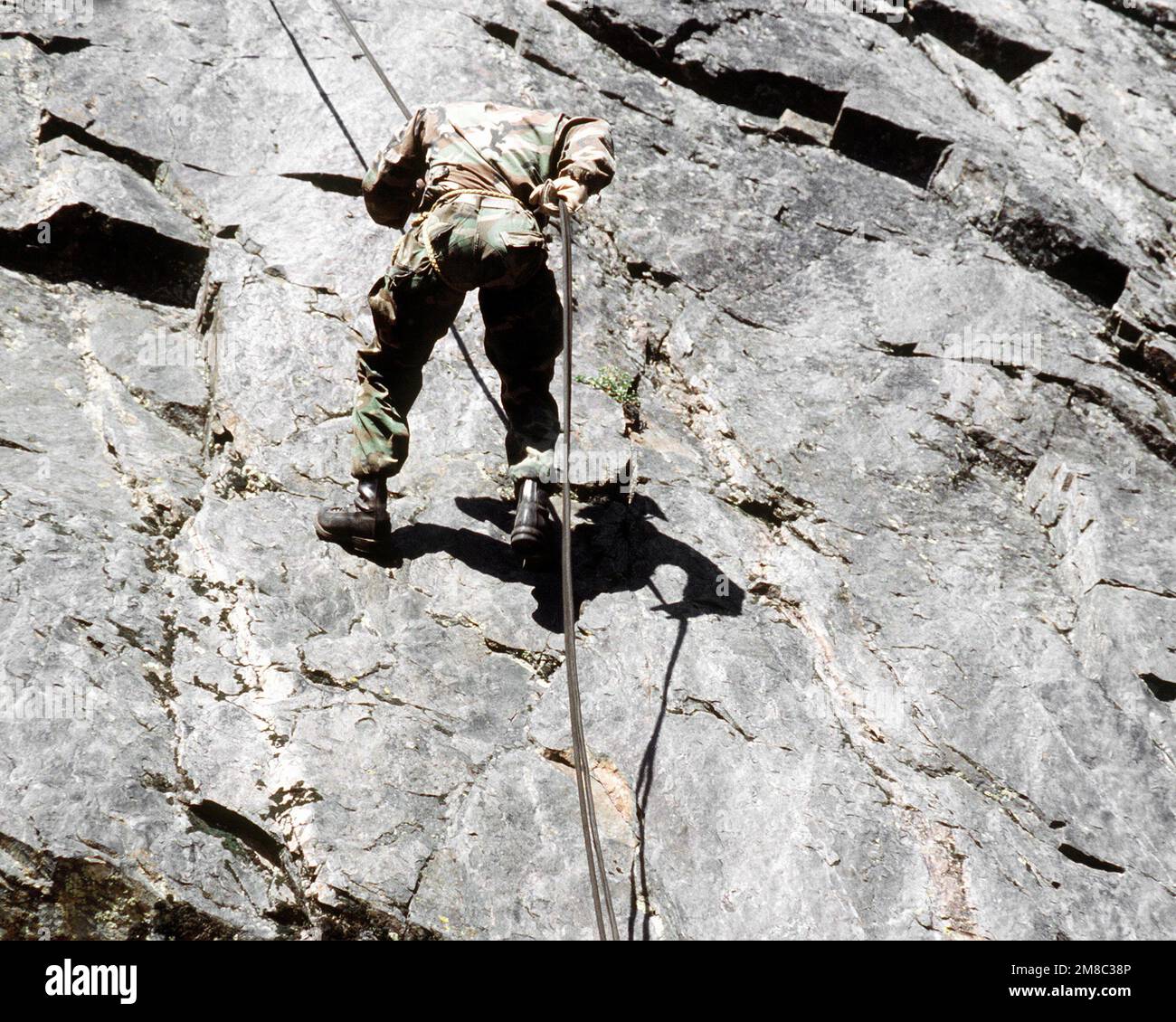 A member of the 3rd Battalion, 9th Marines, descents during a ...