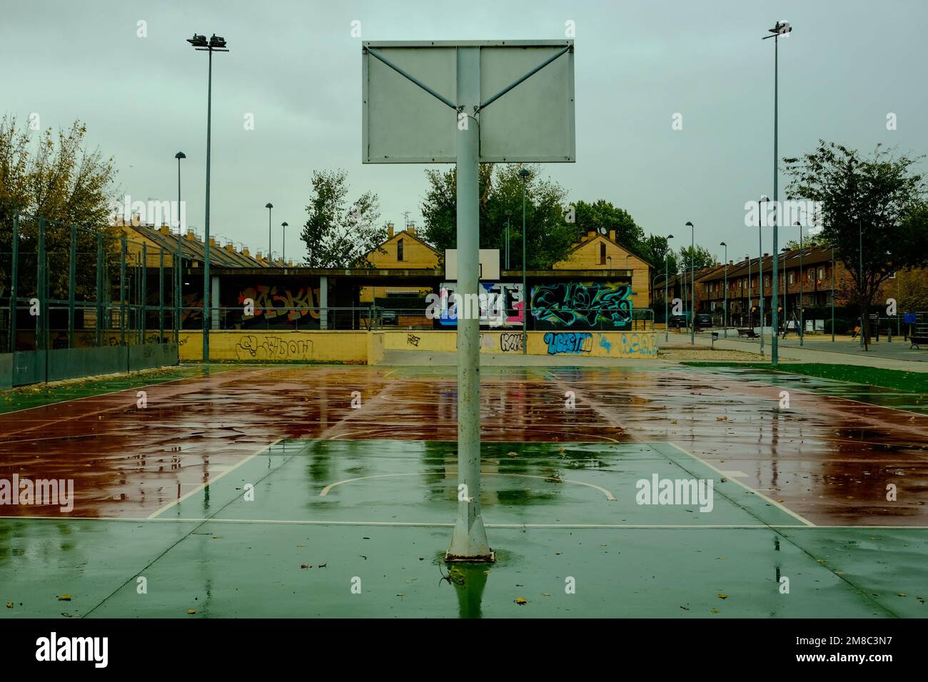 A wet basketball court after the rain Stock Photo Alamy