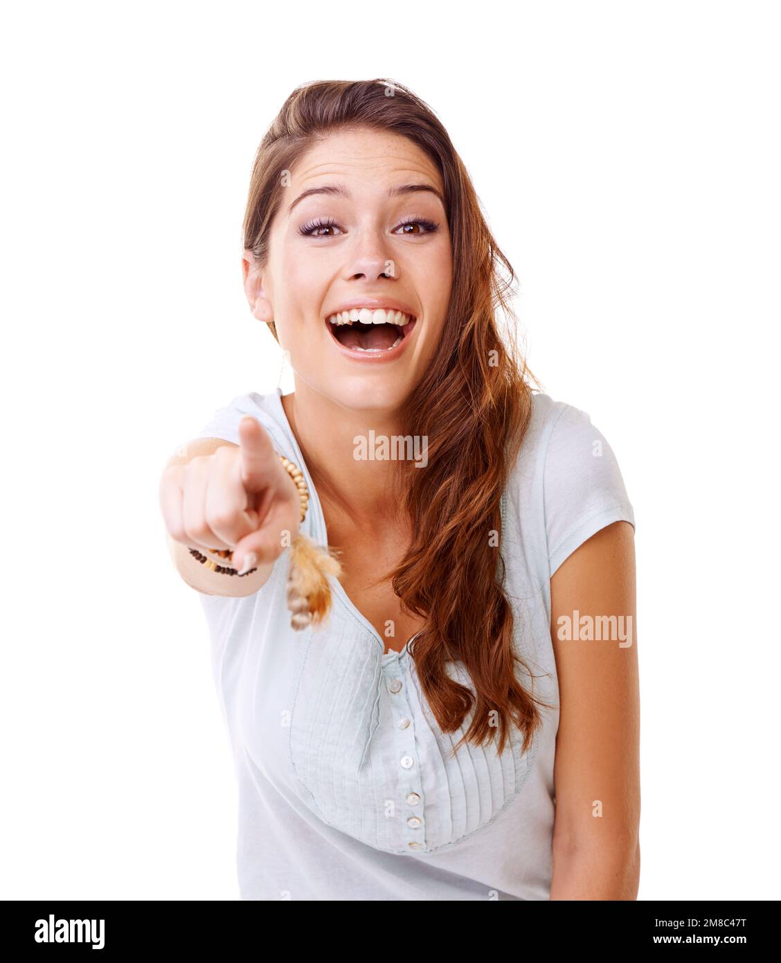 Laugh, bullying and woman pointing in studio on white background for humor, shame and mocking. Body language, mean and portrait of girl point finger Stock Photo