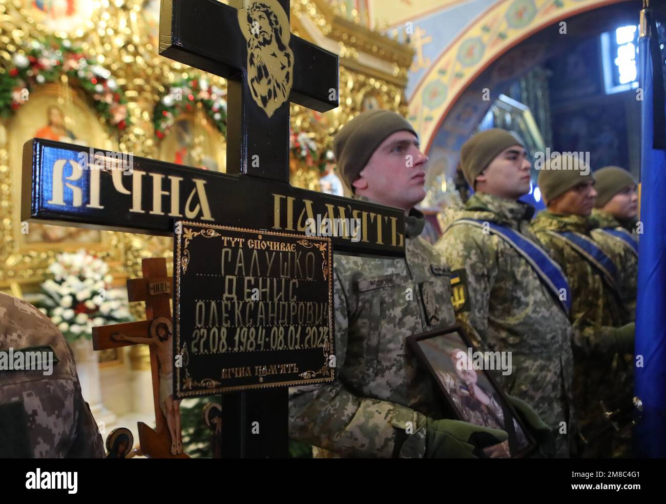 KYIV, UKRAINE - JANUARY 12, 2023 - A graveside cross is pictured during the funeral service of perished Ukrainian defender, volunteer Denys Halushko w Stock Photo