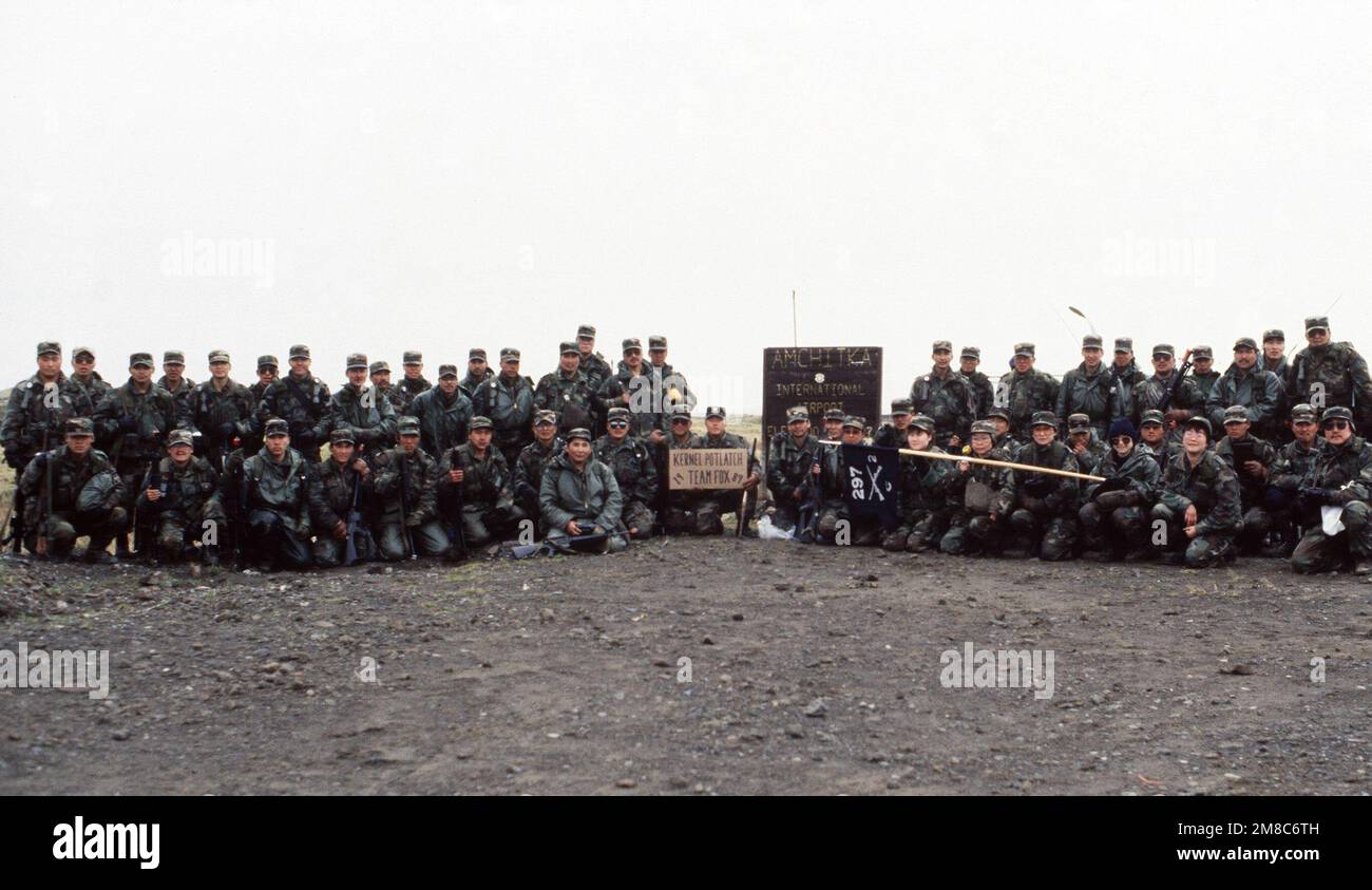 The members of Co. C, 2nd Bn., 297th Infantry Group (Scout), Alaska National Guard, gathers for a group photograph following exercise Kernal Potlatch '89. Subject Operation/Series: KERNAL POTLATCH '89 Base: Amchitka Island State: Alaska (AK) Country: United States Of America (USA) Stock Photo