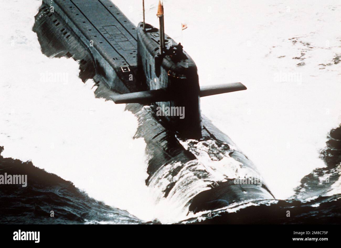A close-up view of a Yankee Notch Class submarine underway. This is a conversion of a Yankee Class Soviet ballistic missile submarine into a strategic cruise missile platform. Country: Unknown Stock Photo