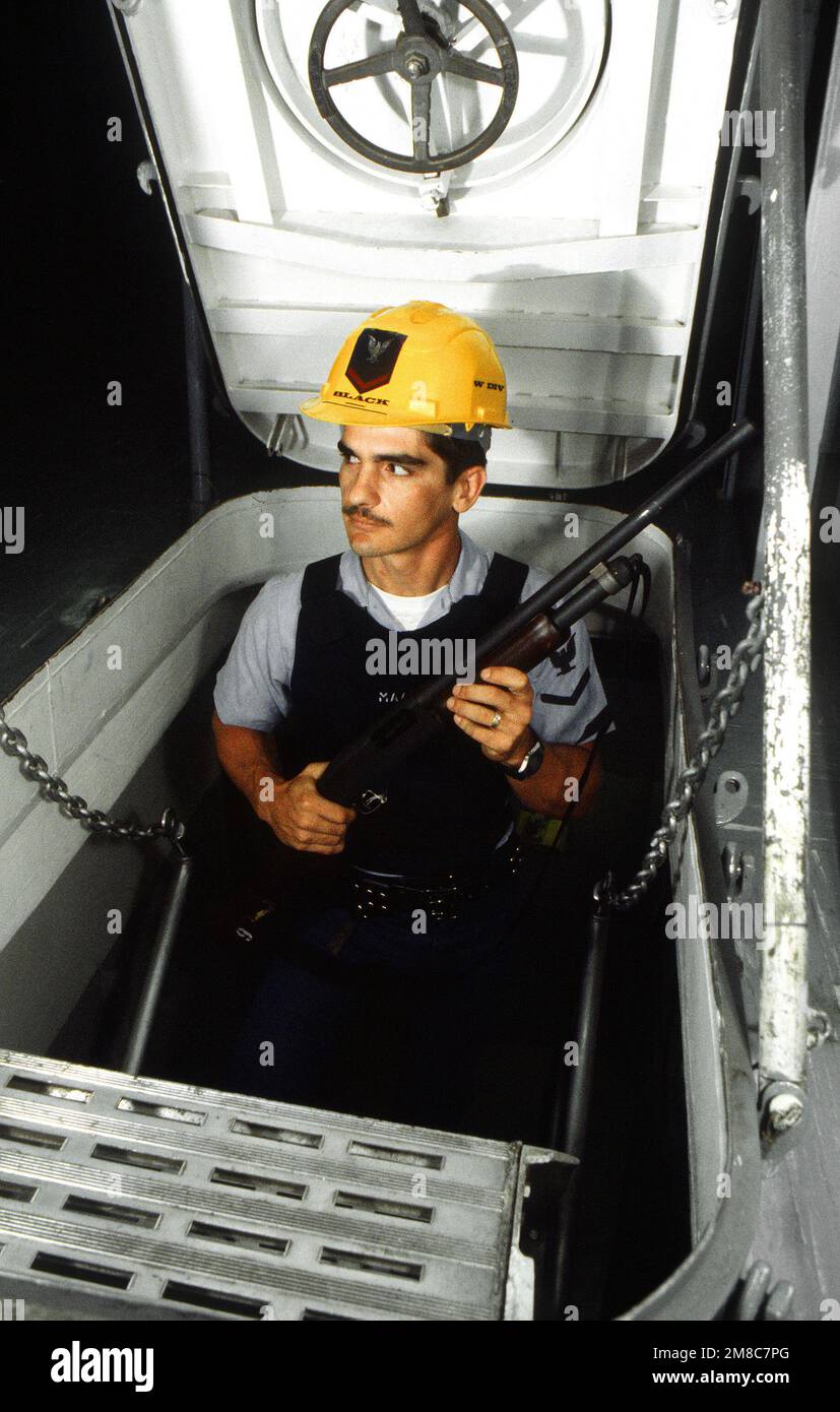 A member of a security response team aboard the nuclear-powered ...