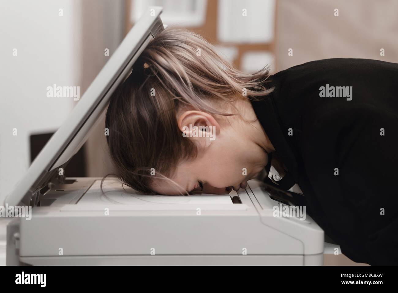 Businesswoman sleeping on printer at office. Overworked concept Stock ...