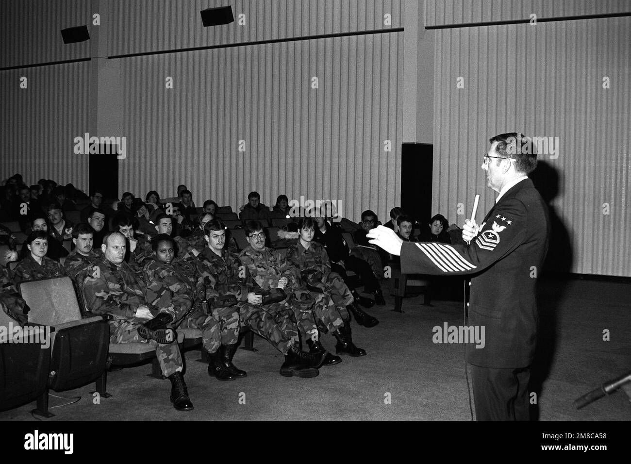 MASTER CHIEF PETTY Officer of the Navy Duane R. Bushey speaks to a