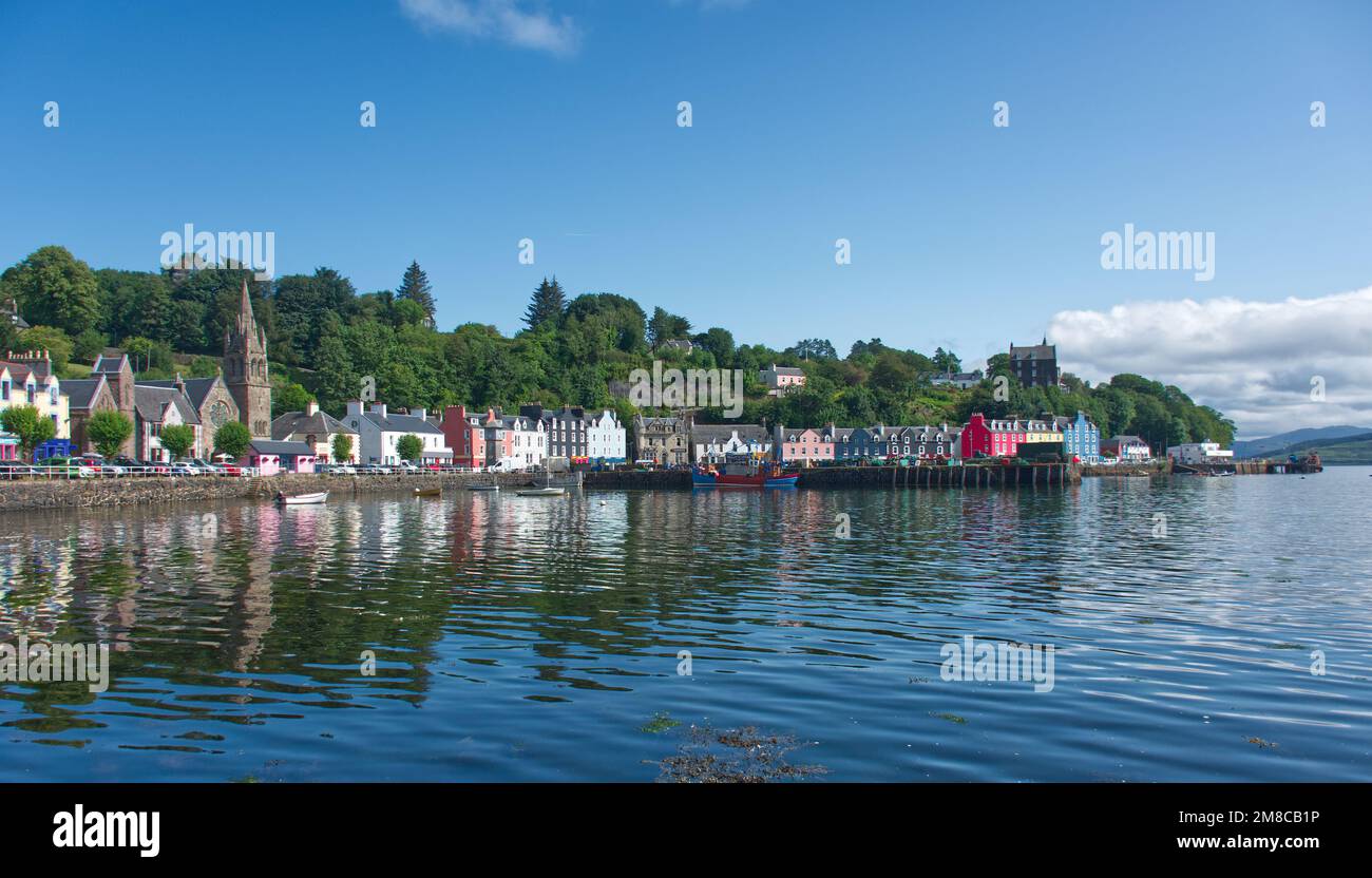 Tobermory Bay, Tobermory, Isle of Mull, Argyll, Scotland with blue skies on a calm summer's day Stock Photo