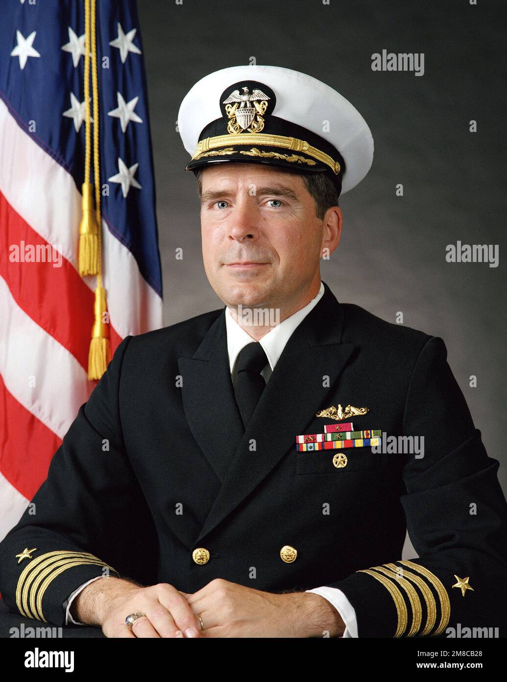 Captain Joseph P. Crociata, USN (covered). Country Unknown Stock Photo