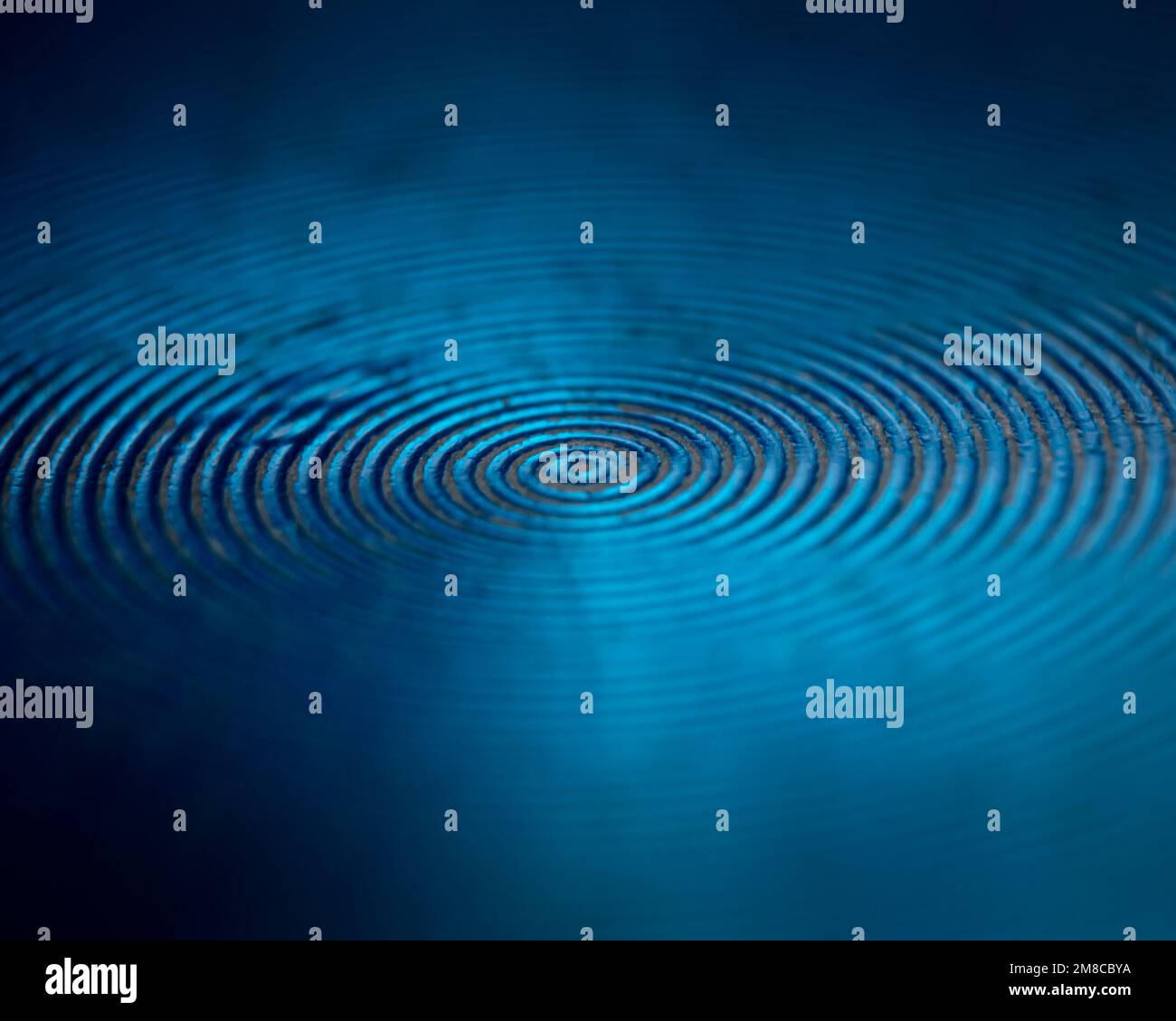 A soft focus of circular grooves on a metal surface Stock Photo Alamy