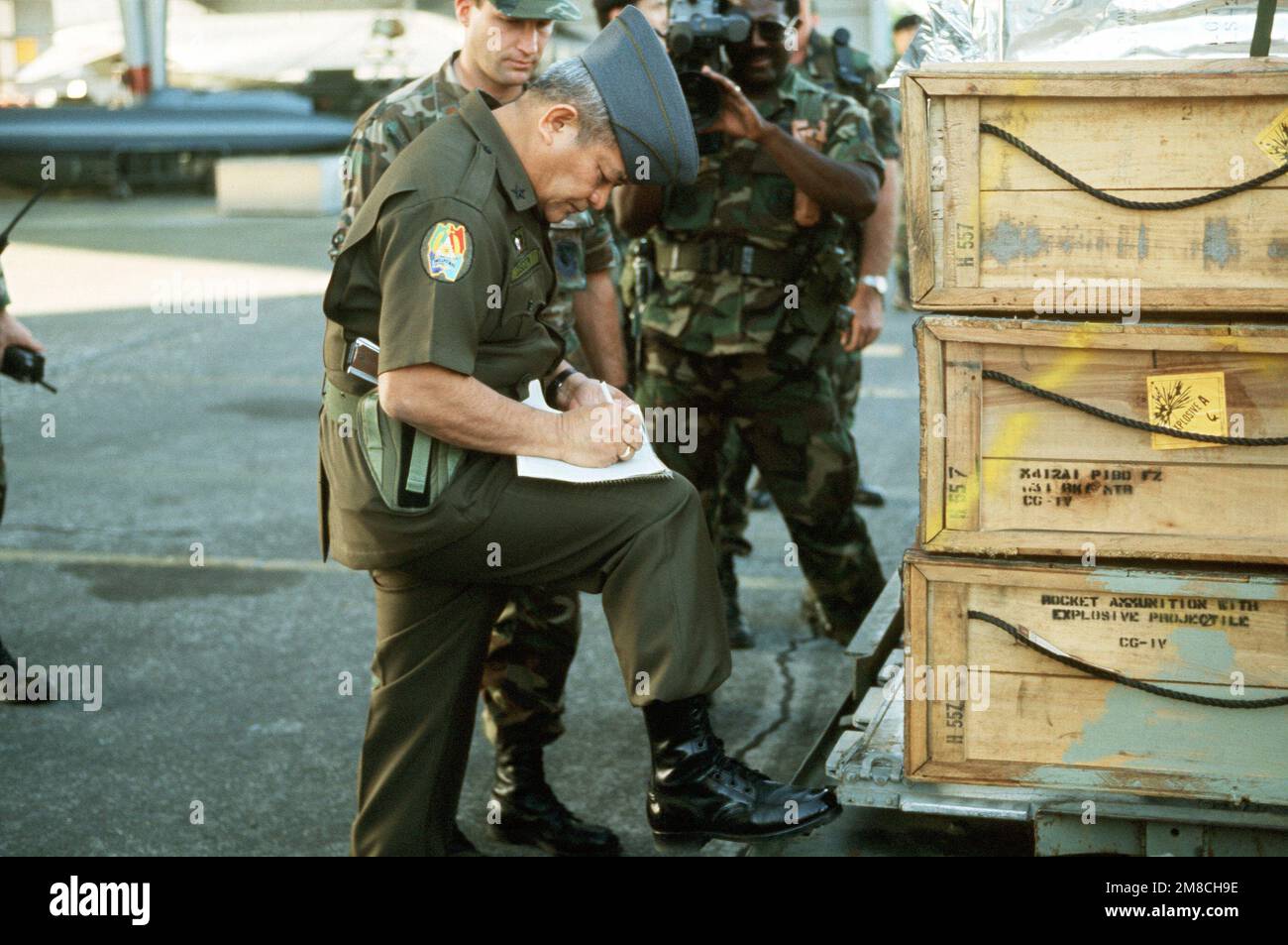 a-u-s-air-force-major-watches-as-a-filipino-general-signs-for-several