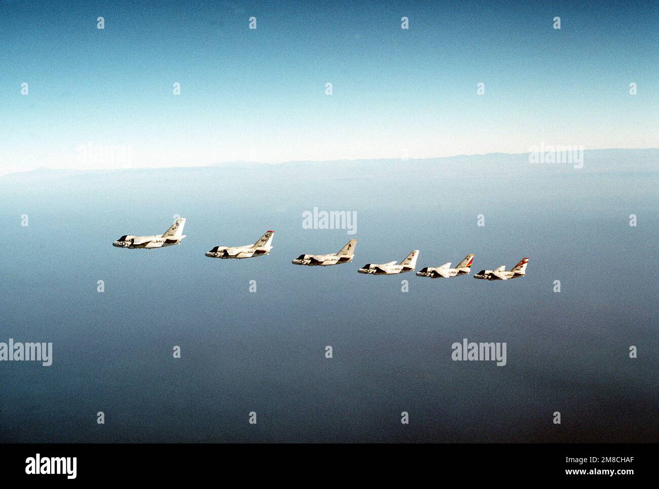 Six S-3A Viking aircraft, each from a different Air Anti-submarine Squadron  (VS), fly in formation during a flight out of Naval Air Station, North  Island, CA. The squadrons are, from left, VS-41