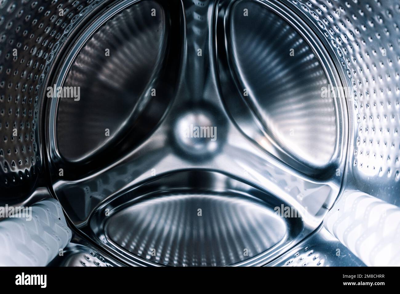 Washing machine drum. Laundry, washing powder concept. High quality