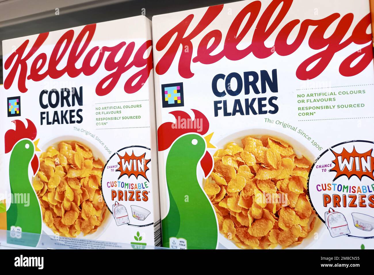 DUSHANBE, TAJIKISTAN - AUGUST 12, 2022: American Kellogg's corn flakes package boxes on the display shelf in the supermarket. Stock Photo