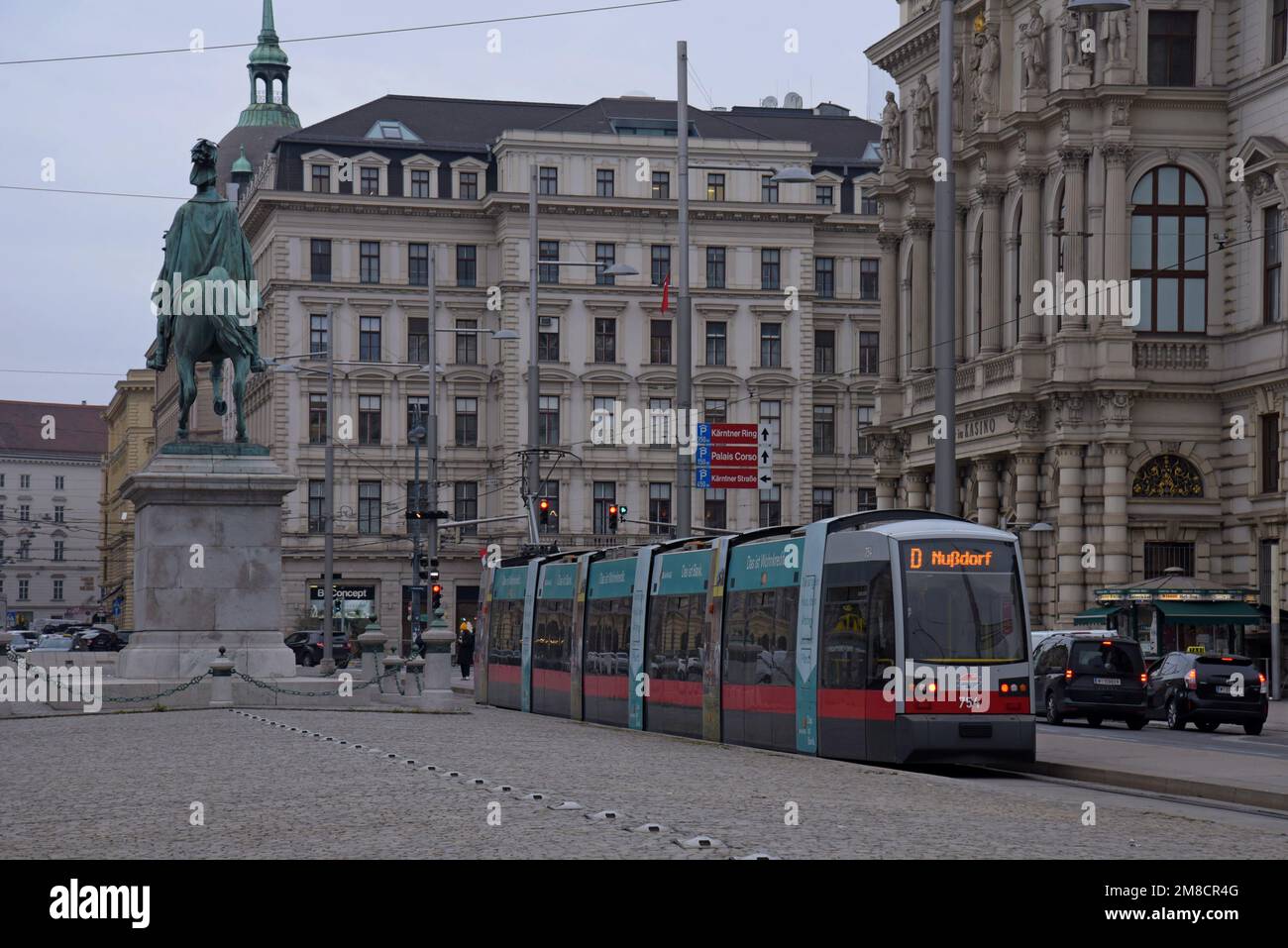 A Siemens ELIN Ultra Low Floor  tram operating beside the statue of Karl Philipp, Prince of Schwarzenberg in Schwarzenberg-Denkmal, Vienna, Austria Stock Photo