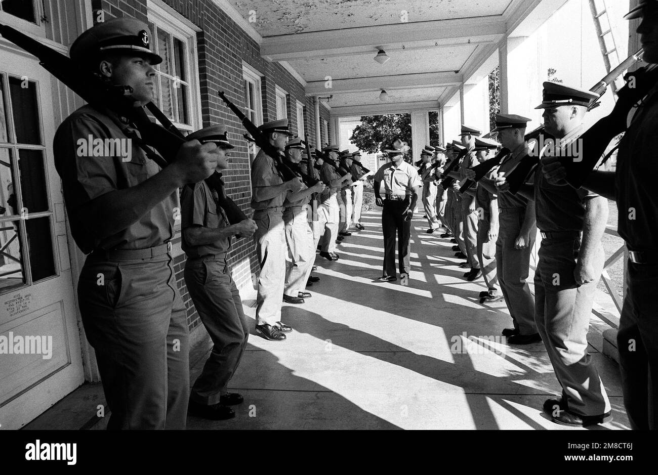 A Marine drill instructor at the Aviation Officer Candidate School ...