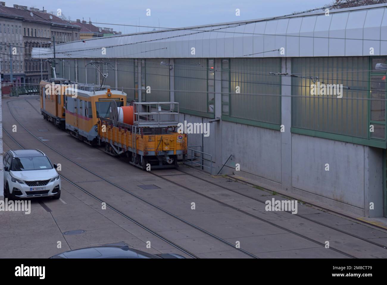 Maintenance and repair vehicles for the Vienna Metro network parked alongside the depot in Betriebsbahnhof Michelbeuern, Vienna, Austria. Dec 202s Stock Photo